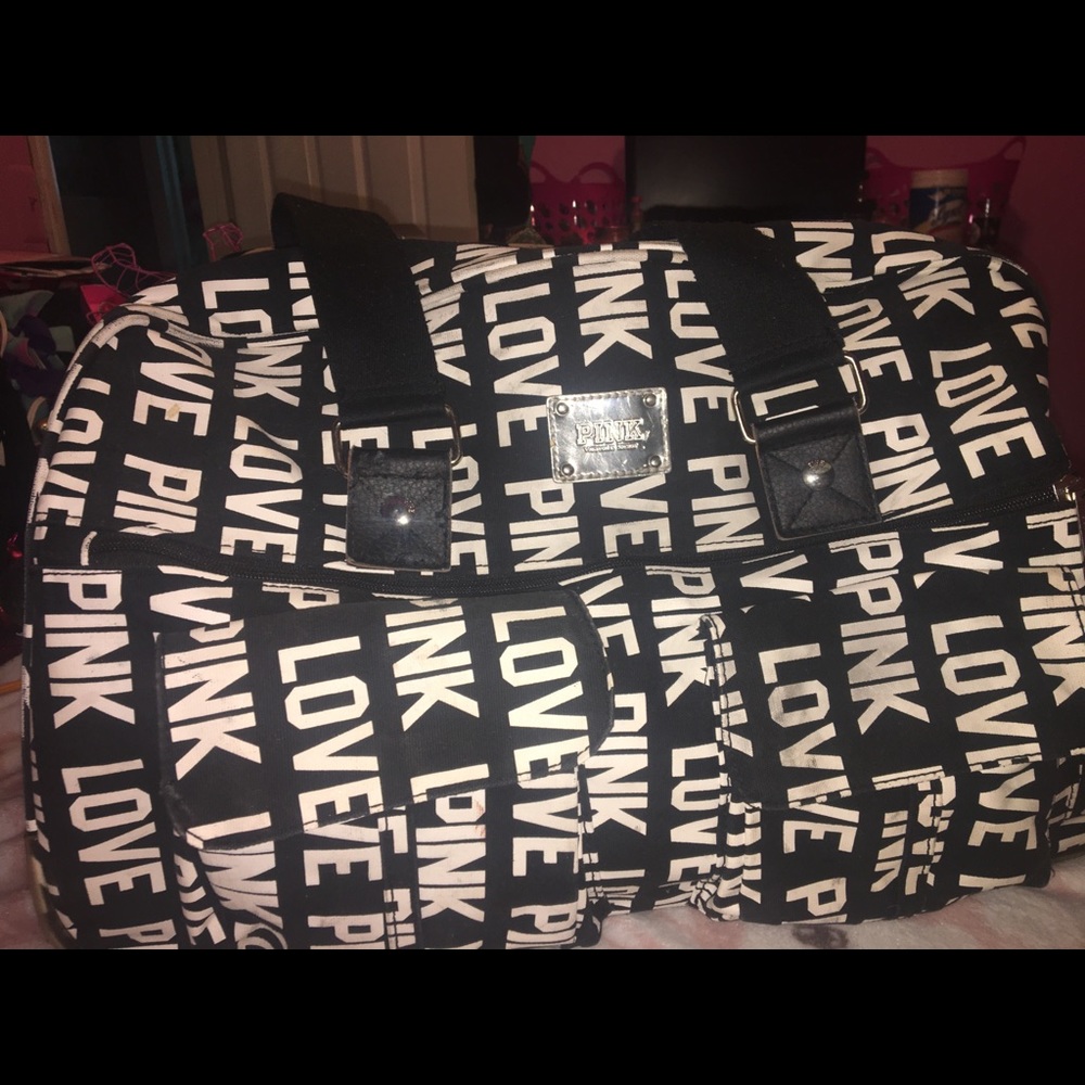 pink rolling duffel bag